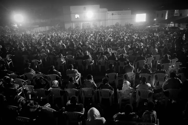 A crowd of young people worshipping at Life Conference